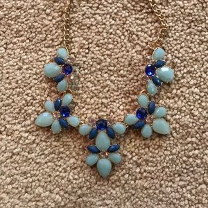 blue flowered statement necklace